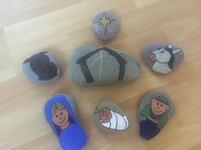 pebbles with Mary and Joseph in the stable with a star