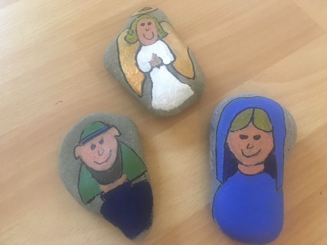 Pebble with pictures of Mary and Joseph and angel